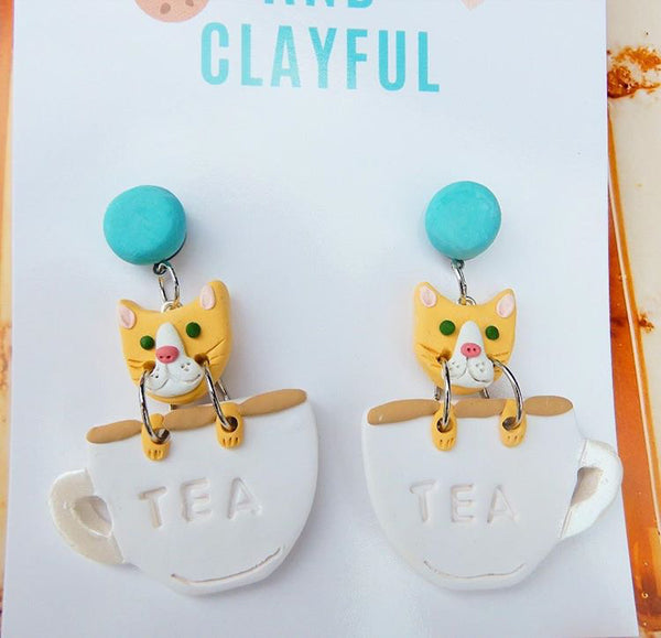 Cats in teacups - blue stud top